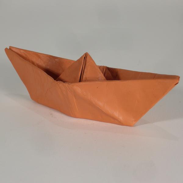 Ceramic sculpture shaped like an origami paper boat, Isidoro Dal Col
